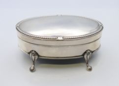 A silver trinket box, hallmarked for Birmingham 1917. 11 cm x 6.5 cm.