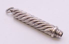 A silver chatelaine pencil holder, hallmarked Birmingham 1901. 6 cm long.