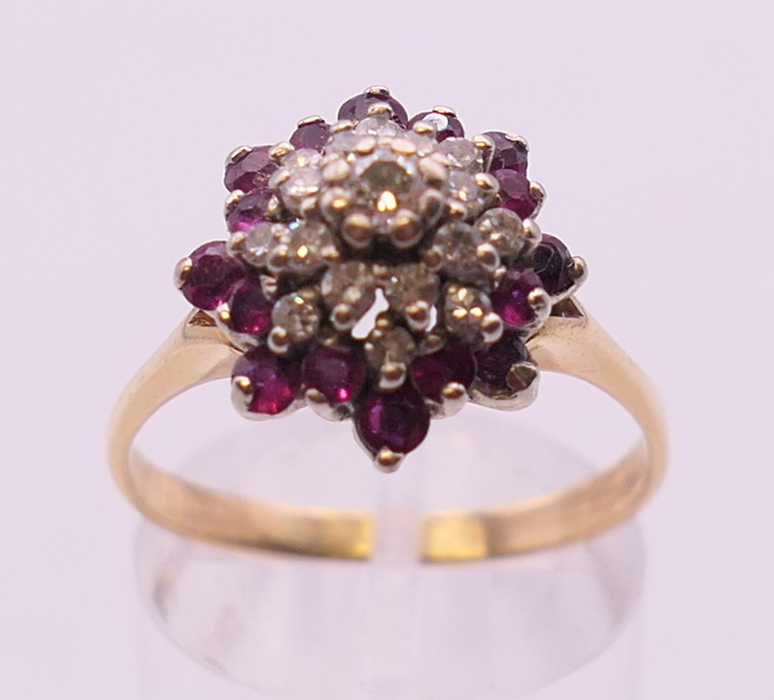 A 14 ct gold ruby and diamond cluster ring. Ring size R/S. - Image 2 of 6