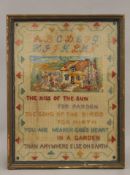 An early 20th century needlework sampler, framed and glazed. 22 x 30 cm.