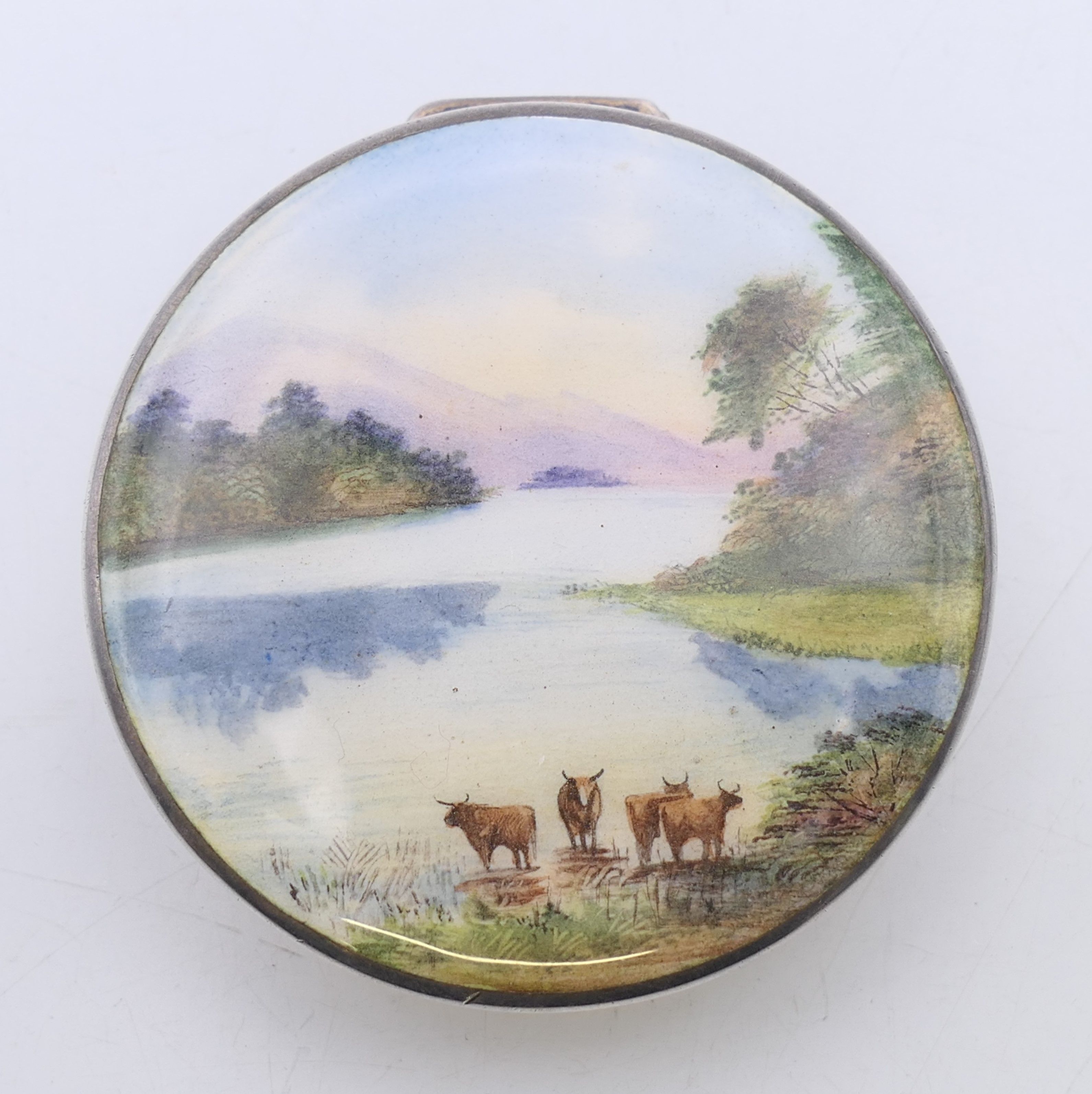 A silver and enamel pill box decorated with cattle in a mountainous landscape, - Image 2 of 7