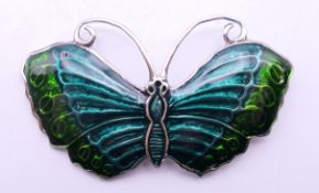 A sterling silver butterfly brooch. 5 cm wide.