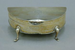 A silver trinket box with World War One Massage Corps inscription ''From A.P.M.M.C.