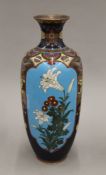 A large late 19th/early 20th century Japanese cloisonne vase decorated with floral sprays.