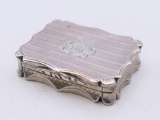 A silver vinaigrette, hallmarked for Birmingham 1845, maker's mark of Nathaniel Mills. 4 cm x 3 cm.