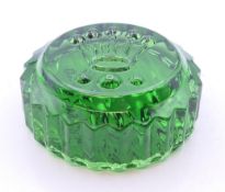 A Rolex glass paperweight. 7 cm diameter.