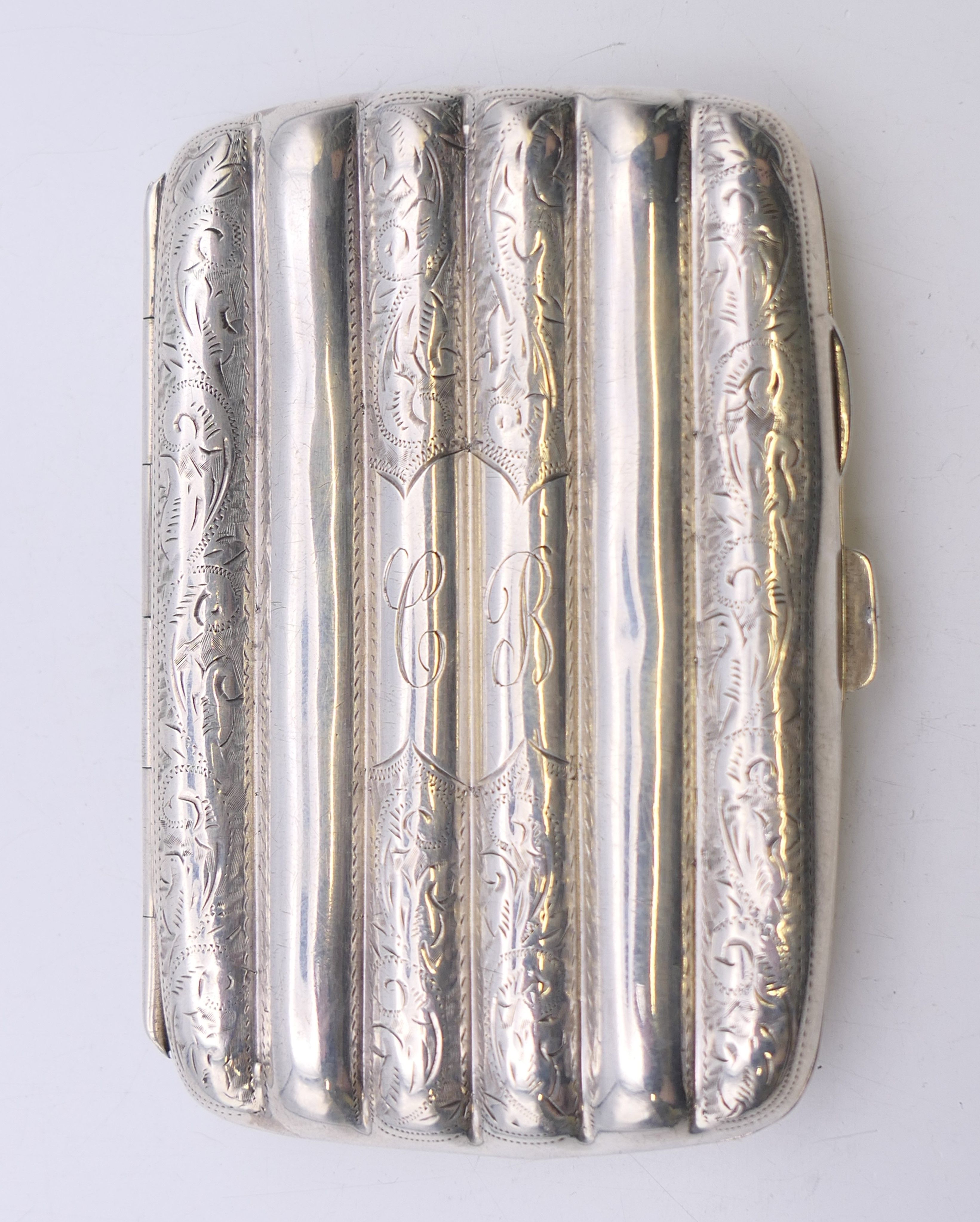 A silver cheroot case, hallmarked for Chester 1905. 9 cm x 6 cm. 49.3 grammes total weight. - Image 2 of 8