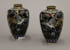 A pair of late 19th/early 20th century Japanese cloisonne vases,