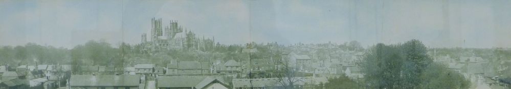 A 1914 photographic panoramic view of Ely by T Bolton, housed in an oak frame. 90.5 x 27 cm overall.