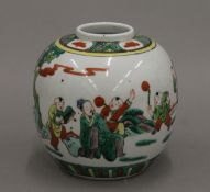 A Chinese famille verte jar with four character mark to base. 12 cm high.