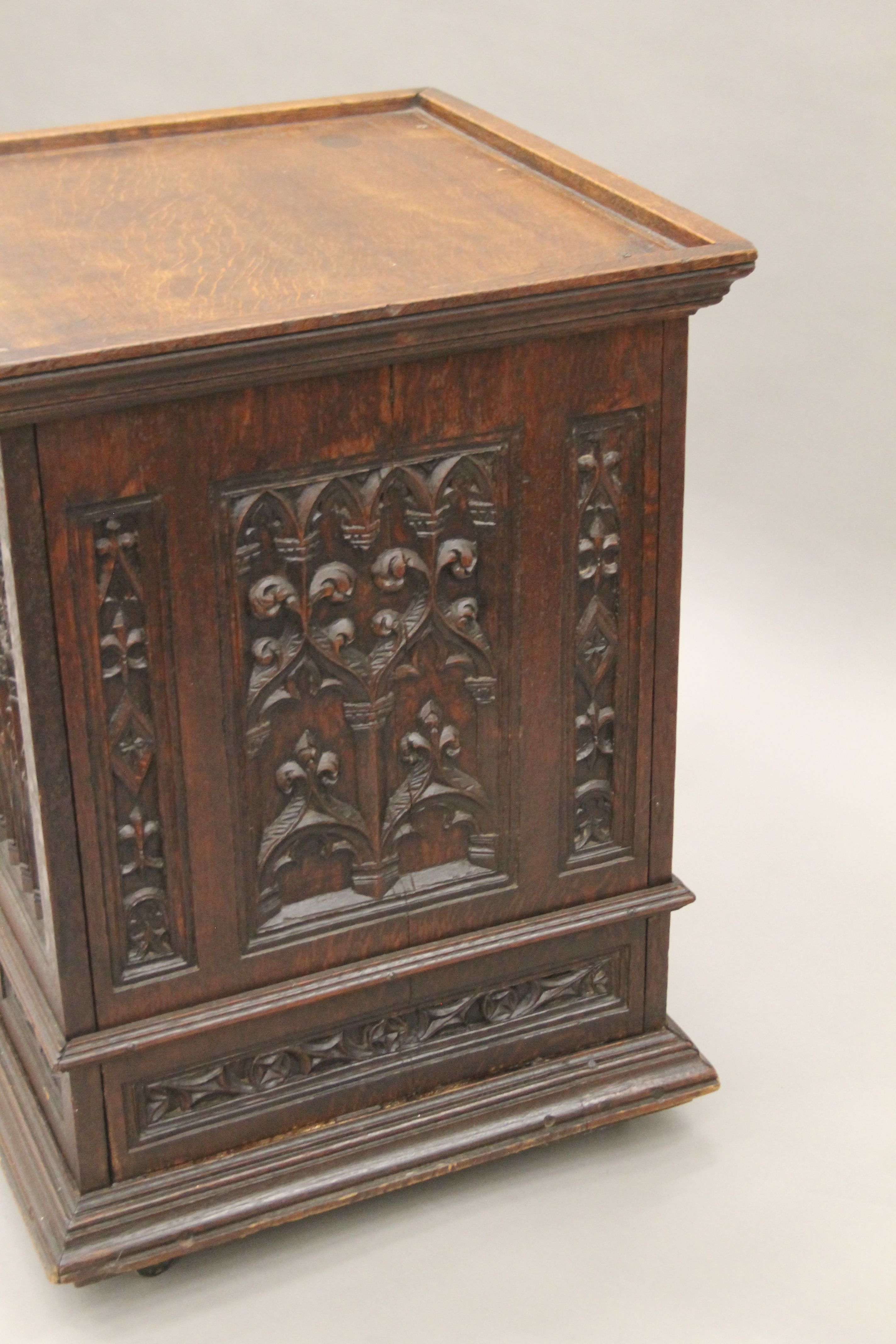 A small Victorian carved oak Gothic Revival cabinet with base drawer. 51.5 cm square. - Image 7 of 7
