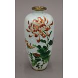 A late 19th/early 20th century Japanese cloisonne vase decorated with floral sprays,