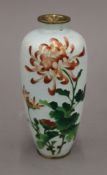 A late 19th/early 20th century Japanese cloisonne vase decorated with floral sprays,