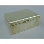 A small Chinese silver cigarette box with presentation inscription. 11.5 cm wide.