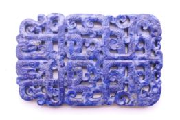 A Chinese pierced lapis tablet. 8 cm high.