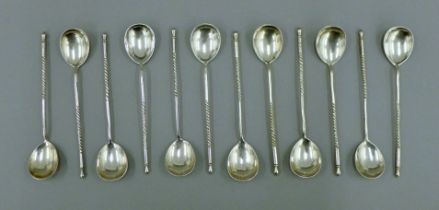 A set of twelve Russian silver teaspoons, 84 mark, dated 1892 with makers initials. 12.5 cm long.