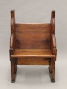 A pitch pine single seat church pew. 67 cm wide.