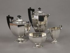 An Art Deco four-piece silver plated tea set. The largest 27.5 cm high.