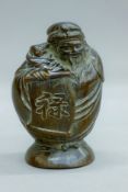 A Chinese carved figure. 14.5 cm high.