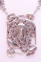 An Art Nouveau style sterling silver pendant necklace. Pendant 6 cm high.