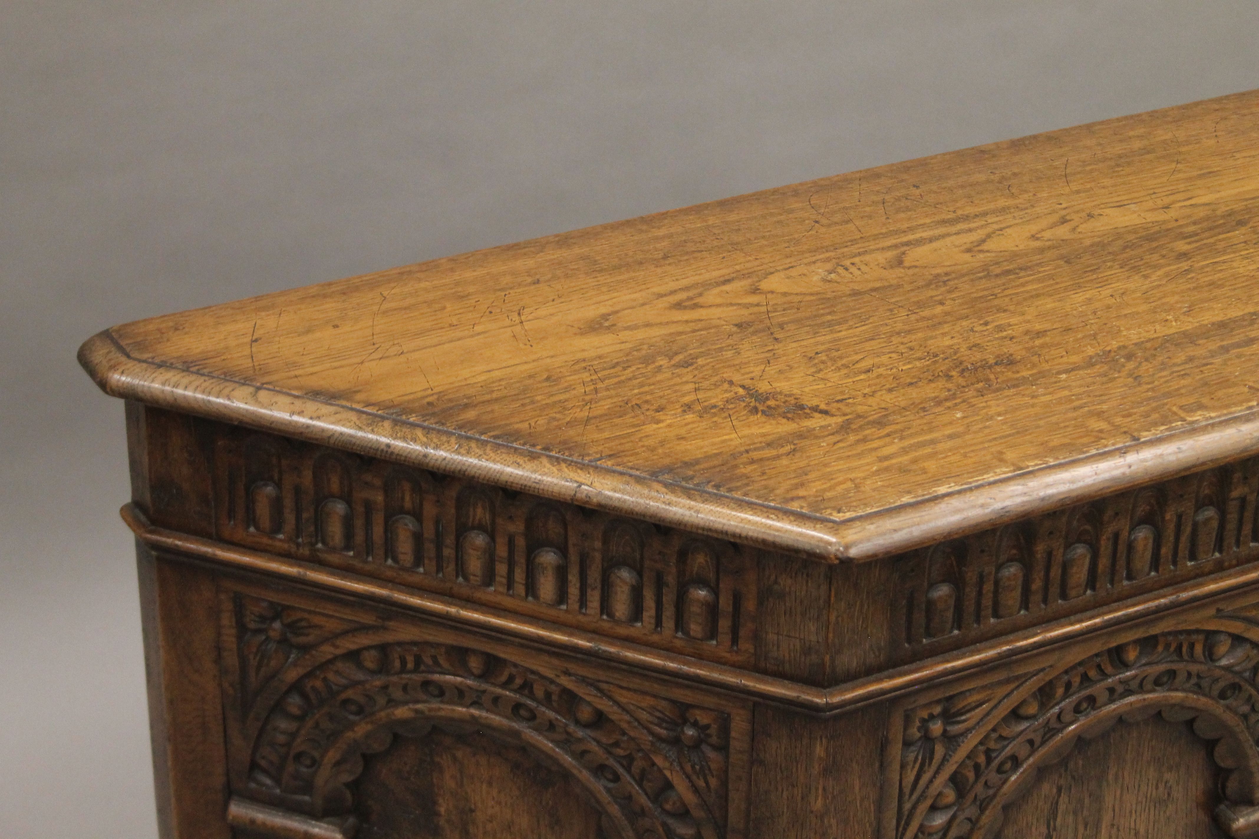 A carved oak canted corner trunk. - Image 3 of 6