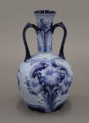 A William Moorcroft Macintyre Florianware vase. 14 cm high.