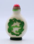 A Peking glass snuff bottle. 7 cm high.