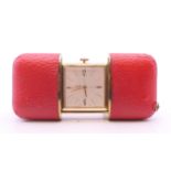 A vintage Oris purse watch in plush red travel case. 8 cm wide open.