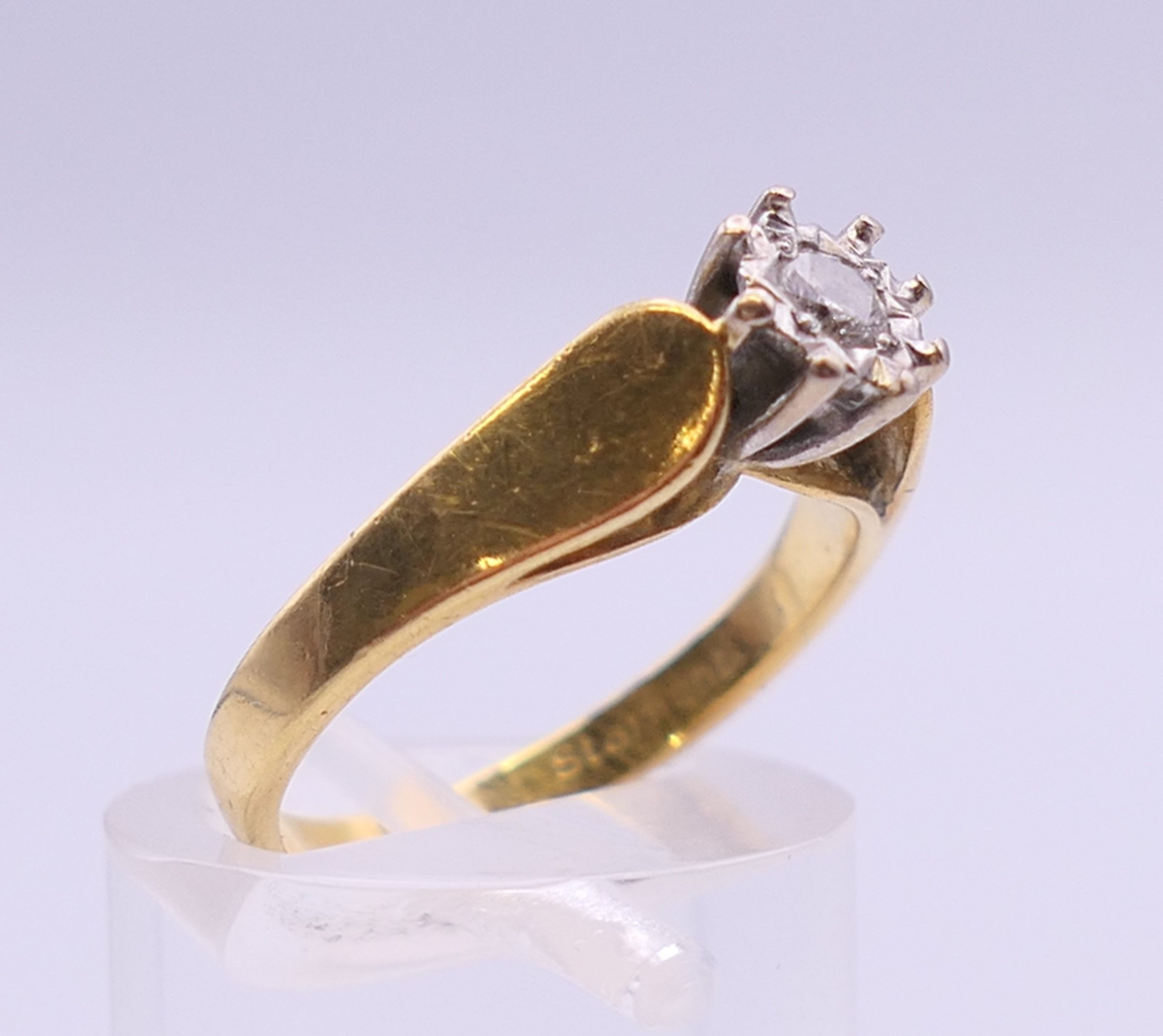 An 18 ct gold diamond solitaire ring. Ring size L/M. - Image 3 of 6