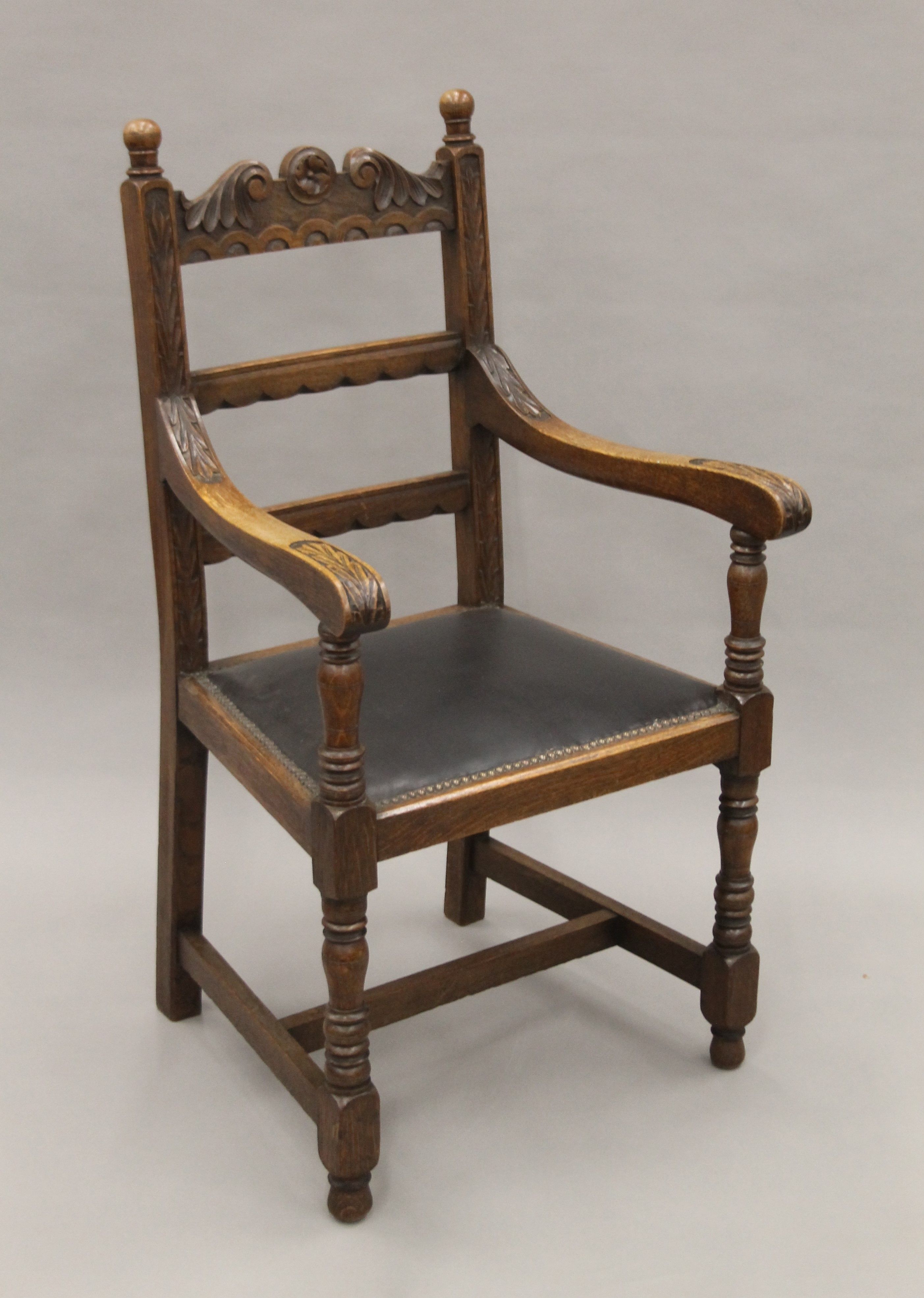 A pair of carved oak open armchairs. Each 57.5 cm wide. - Image 4 of 7