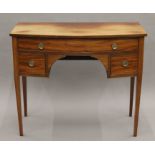 A 19th century mahogany bow front side table. 100 cm wide.