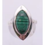 A silver malachite ring. Ring size M.