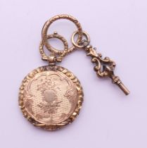 A Victorian mourning locket with inset hair plait. 2.5 cm diameter.