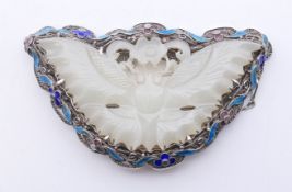 A Chinese silver and enamel mounted carved jade butterfly form brooch. 6.5 cm wide.