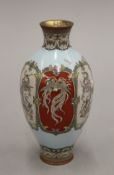 A late 19th/early 20th century Japanese cloisonne vase of hexagonal form decorated with dragons and
