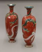 A pair of large late 19th/early 20th century Japanese cloisonne vases decorated with dragons. 61.