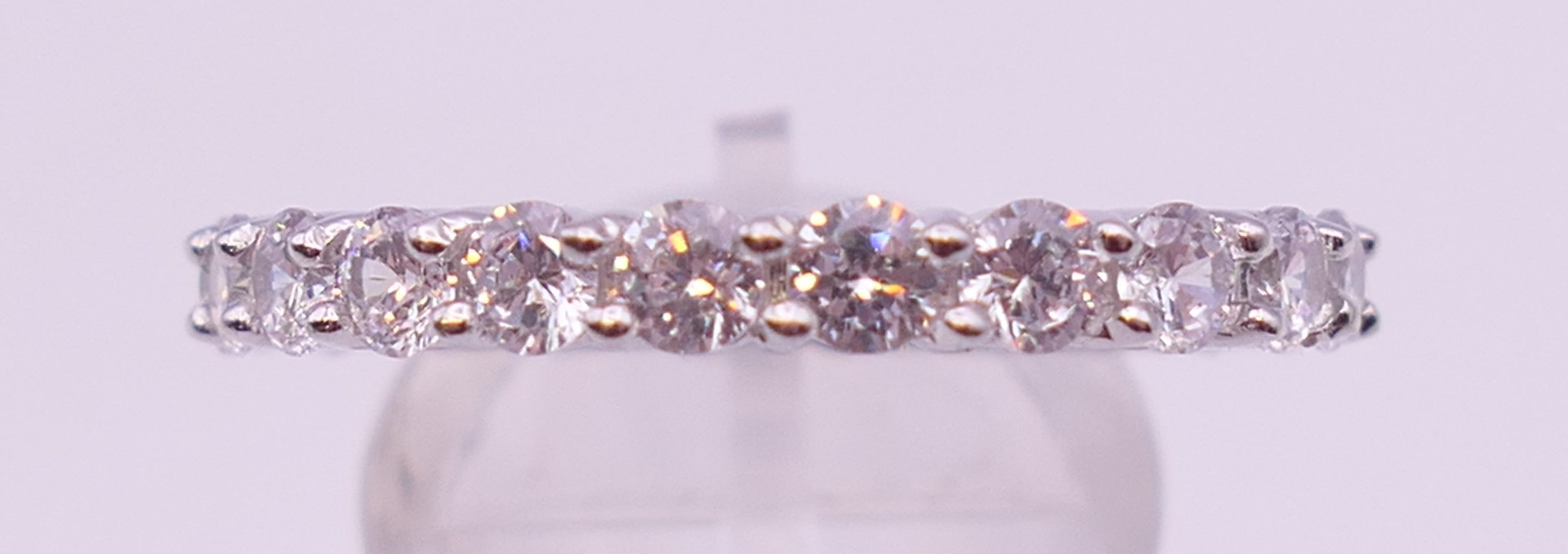 A silver and cubic zirconia full eternity ring. Ring size U. - Image 2 of 5
