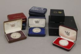 A quantity of various New Zealand and Canadian silver proof coins.