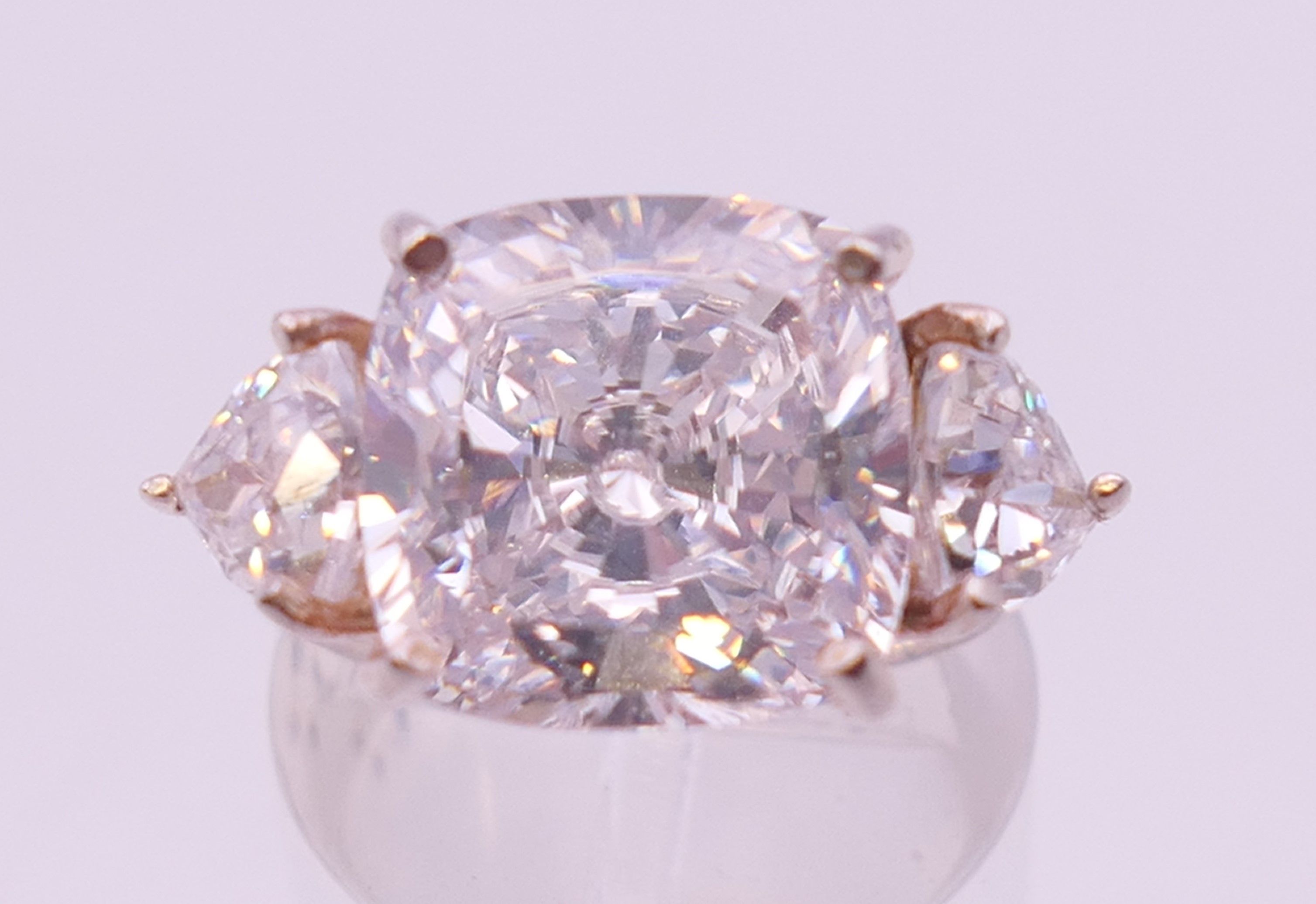 A silver cubic zirconia three stone ring. Ring size K/L. - Image 2 of 6