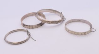 Four silver bangles. The largest 7 cm wide. 64.6 grammes.