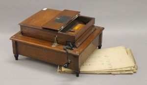 A vintage organette. 36.5 cm long.