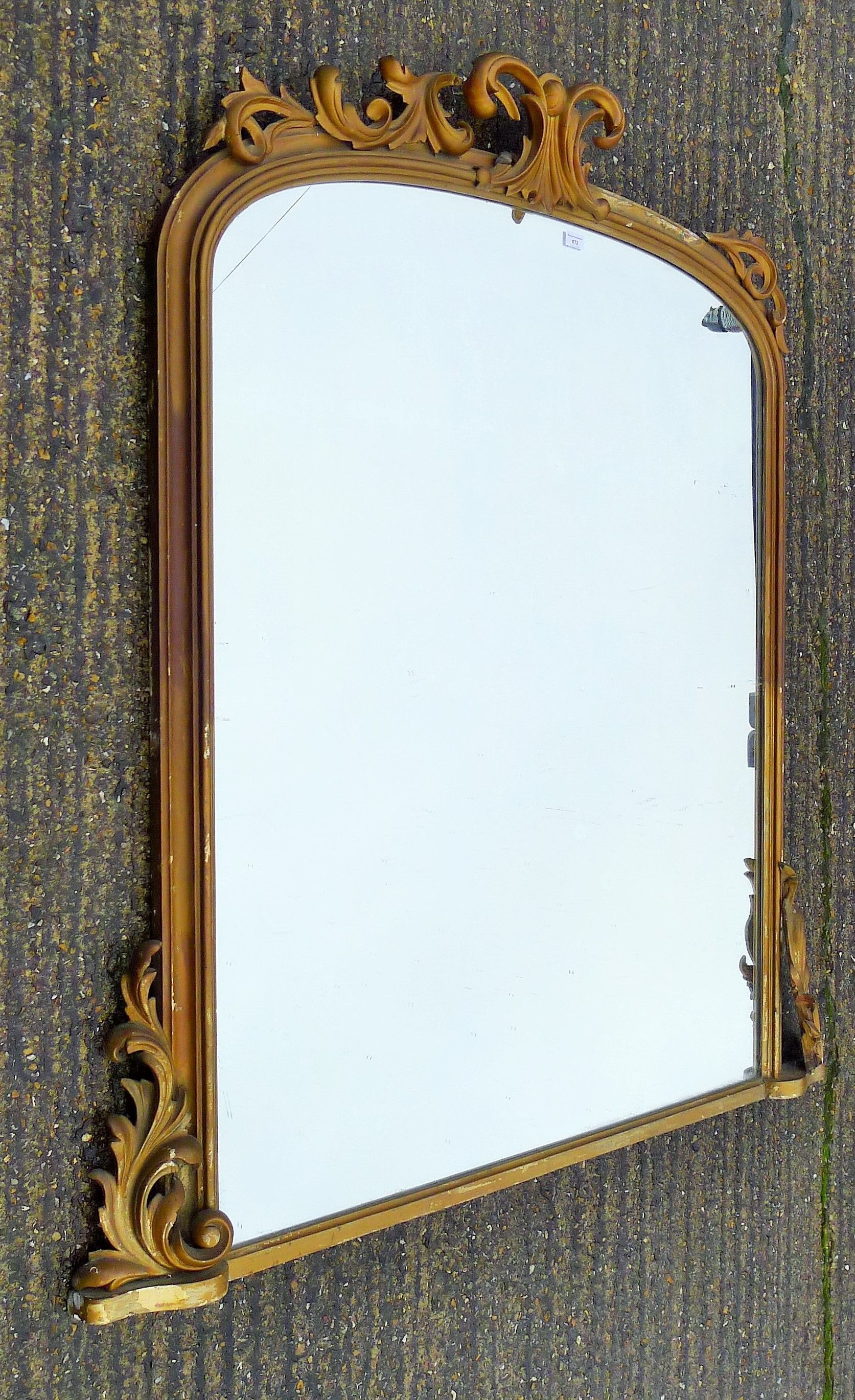 A Victorian gilt framed overmantle mirror. 143 cm wide x 155 cm high.