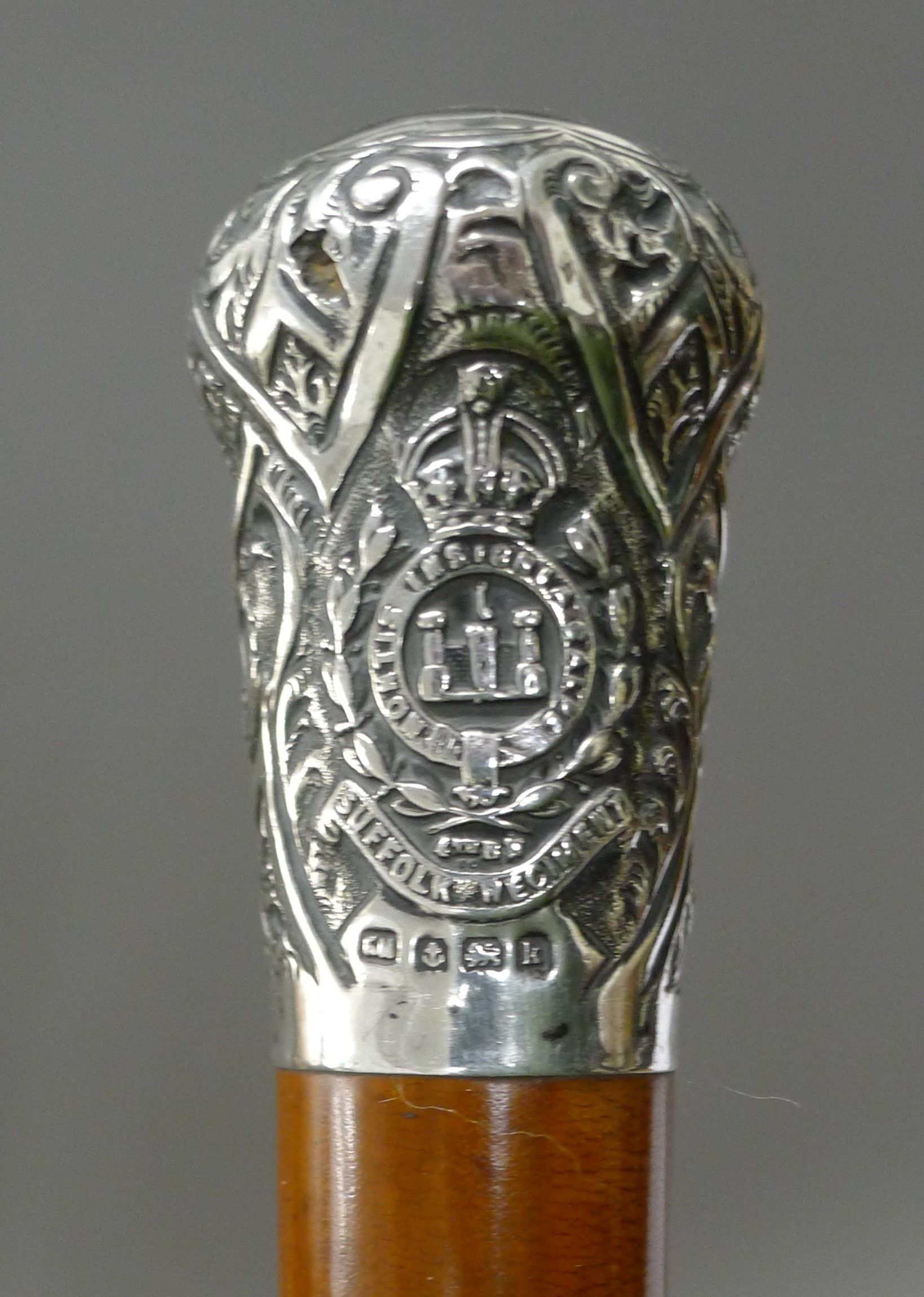 A silver mounted malacca cane decorated with Suffolk Regiment 4th Battalion insignia, - Image 2 of 4