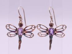 A pair of silver dragonfly earrings. 2.5 cm high.