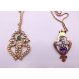 An antique 9 ct gold rope twist necklace with pendant and a double heart pendant set with pearls on