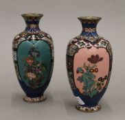 A pair of late 19th/early 20th century Japanese cloisonne vases decorated with various foliage. 17.