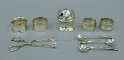 A small quantity of various silver items, including a mustard pot, three salt spoons,