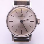 A ladies stainless steel cased Omega wristwatch. 2 cm wide.