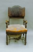 A 19th century mahogany leather upholstered open armchair, with label to webbing for Elephant Brand,