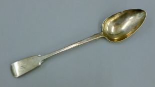 A Victorian silver basting spoon. 30 cm long. 126.3 grammes.